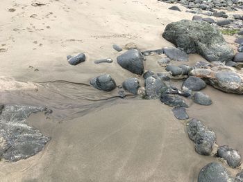 High angle view of stones on beach