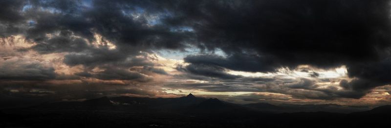 Scenic view of dramatic sky during sunset