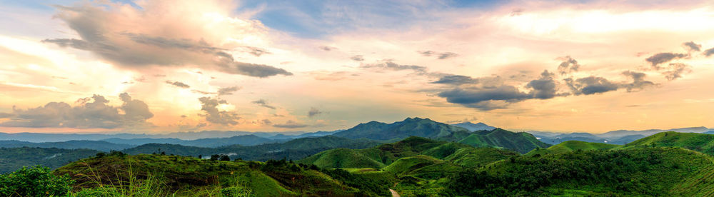 Scenic view of mountains against sky during sunset