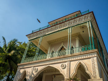 Low angle view of built structure against blue sky