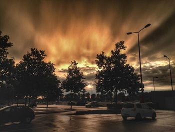 Road against cloudy sky at sunset