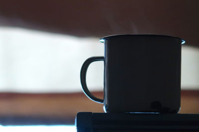 Close-up of electric lamp at home