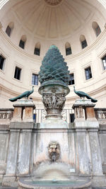 Low angle view of fountain building