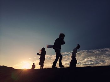 Woman looking at sunset