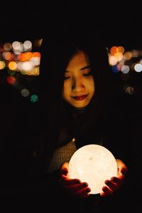 Portrait of woman holding ice cream