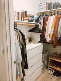 Clothes hanging on rack in store