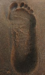 High angle view of sand on beach