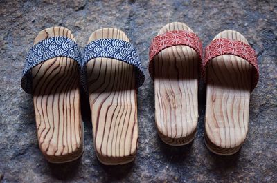 High angle view of sandals on road