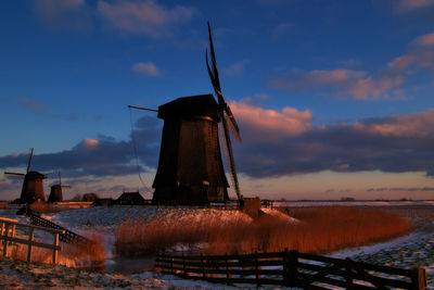 17th century windmills in dutch polder
