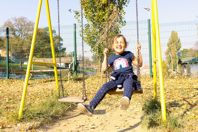 Portrait of smiling girl on playground