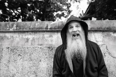 Portrait of man standing outdoors