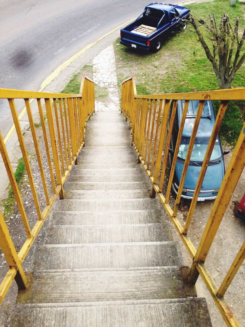 railing, the way forward, diminishing perspective, empty, footbridge, high angle view, wood - material, boardwalk, narrow, vanishing point, steps, steps and staircases, absence, sunlight, walkway, staircase, day, long, no people, outdoors