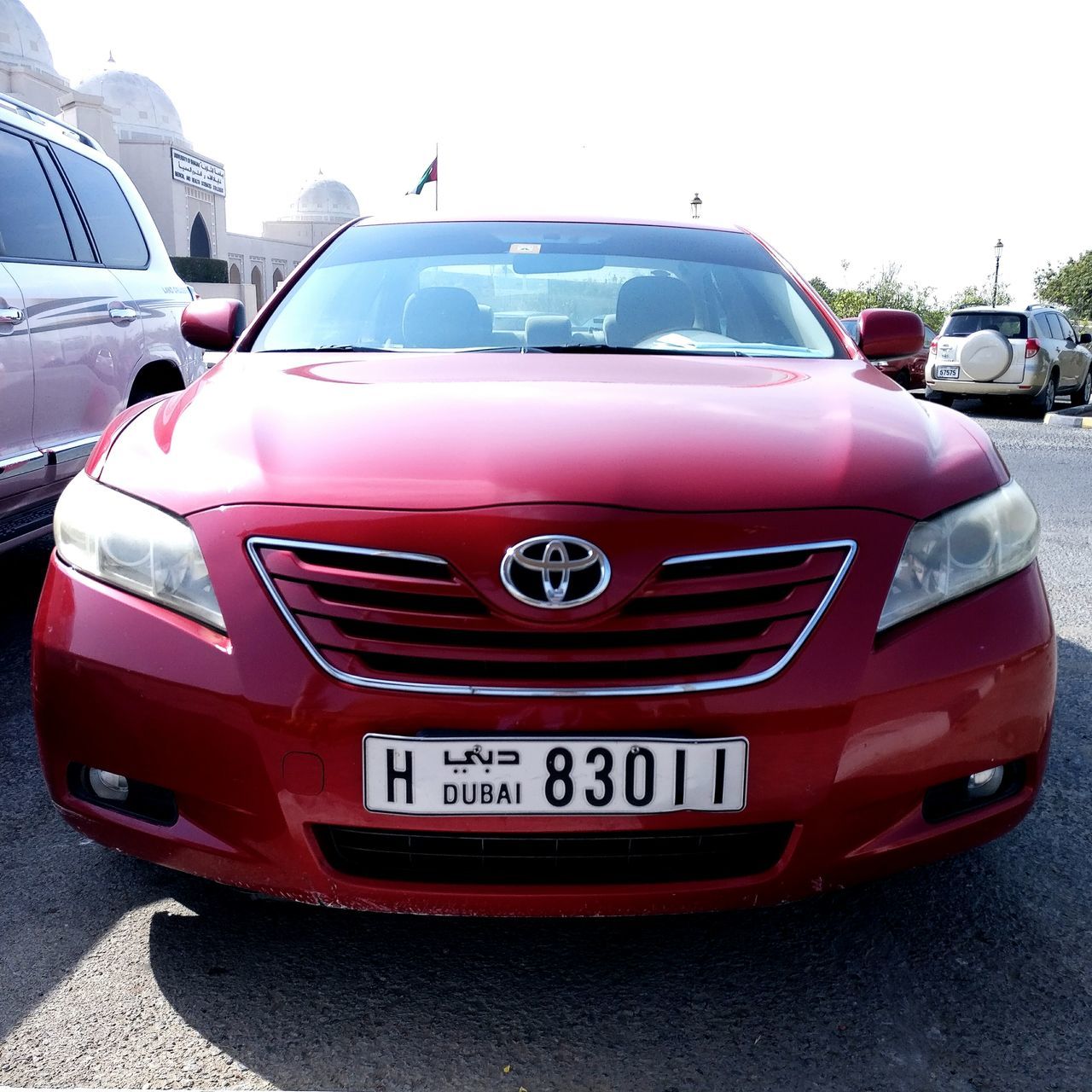 car, transportation, red, luxury, land vehicle, no people, outdoors, day