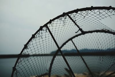 Low angle view of chainlink fence