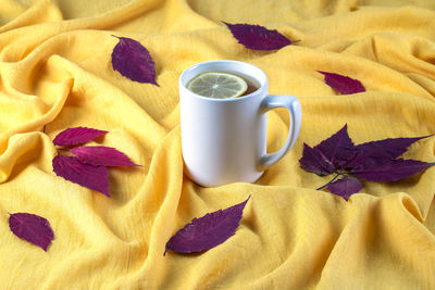 Close-up of coffee cup on table