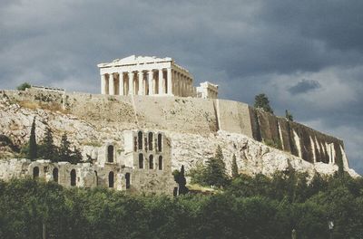 View of historic building against cloudy sky