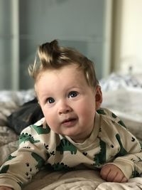 Close-up of cute baby boy at home