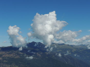 Scenic view of volcanic mountain against sky