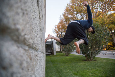 Full length of man jumping at park