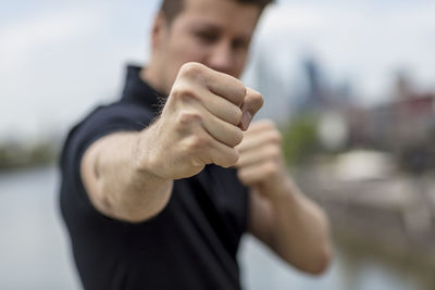Young man in fighting stance