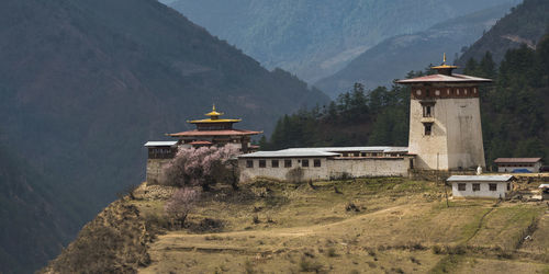 View of historic building against mountain range