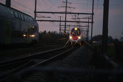 Train on railroad track against sky