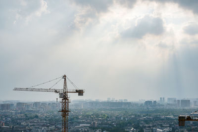 Crane against sky