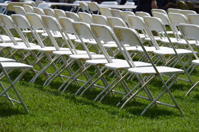 Empty chairs in lawn