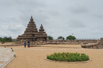 Group of people in temple against building