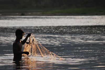 Woman standing in water