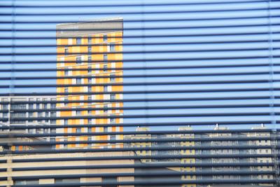 Modern building seen through glass window