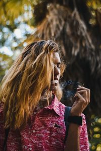 Young woman drinking water