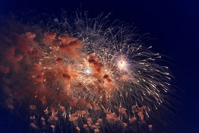 Low angle view of firework display