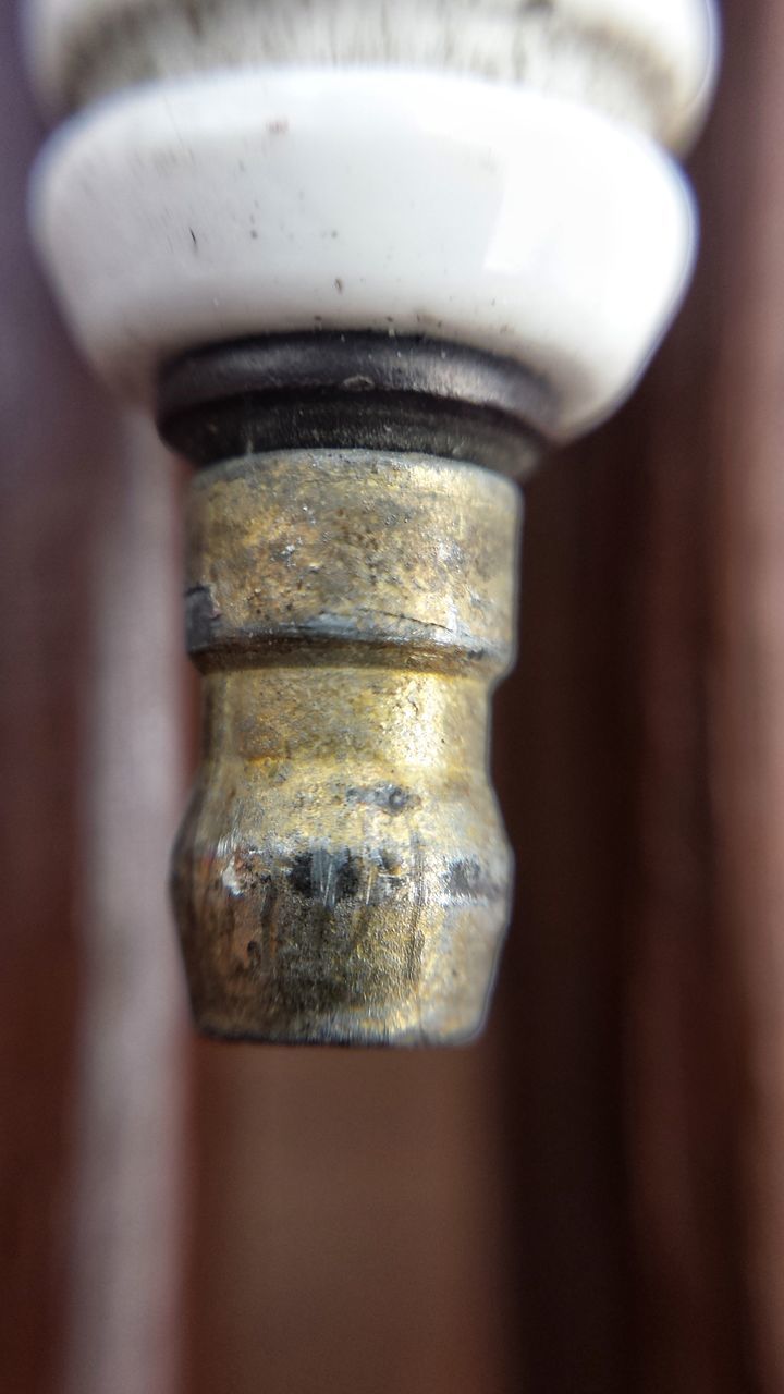 CLOSE UP OF METAL OBJECT