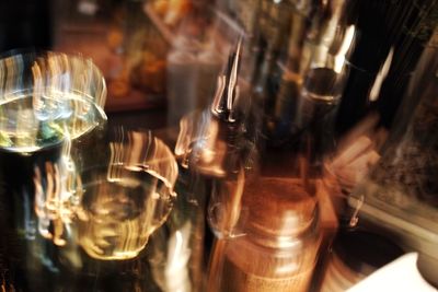 Close-up of wine bottles on table