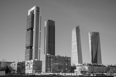 Low angle view of buildings against clear sky