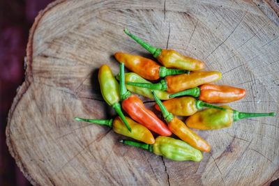 High angle view of chili peppers on table