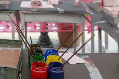 Close-up of paintbrushes on table