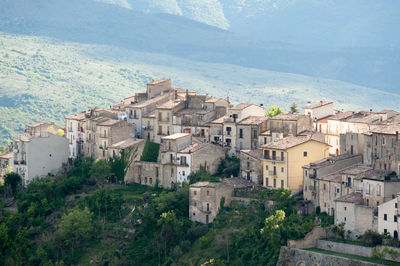 High angle view of houses and mountains