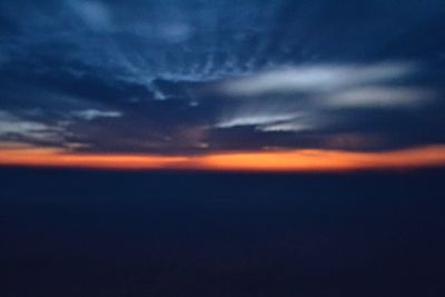 Scenic view of dramatic sky during sunset