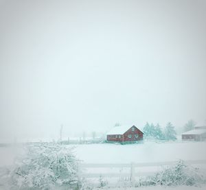 View of frozen river against cloudy sky