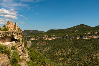 View of old ruin on mountain against sky