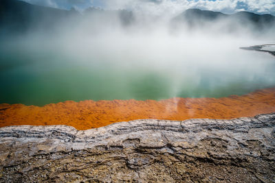 Scenic view of mountains during foggy weather