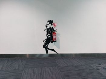 Man photographing on wall