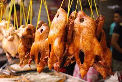 Close-up of roasted chicken for sale at market