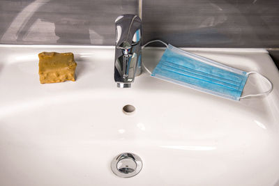 High angle view of faucet in bathroom