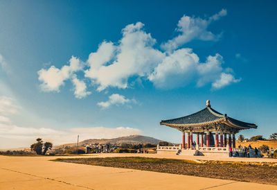 View of temple against cloudy sky