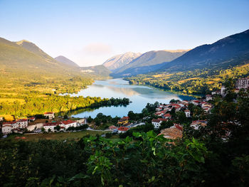 Scenic view of landscape and mountains against sky