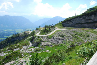 High angle view of road amidst mountains against sky