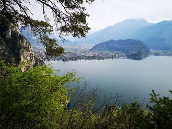 Scenic view of lake and mountains against sky